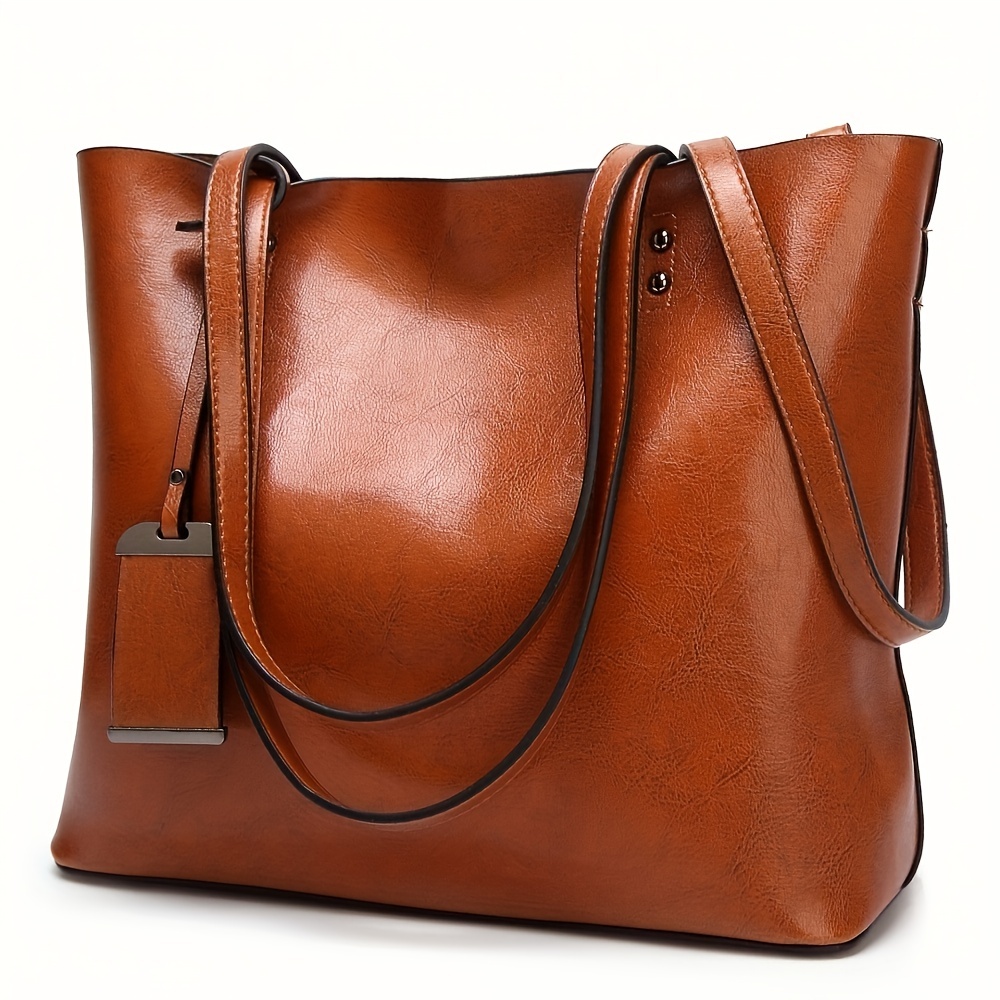 Moda klasik Retro deri kadın T - Leather Work Handbags For Women incelemesi ve fiyatı